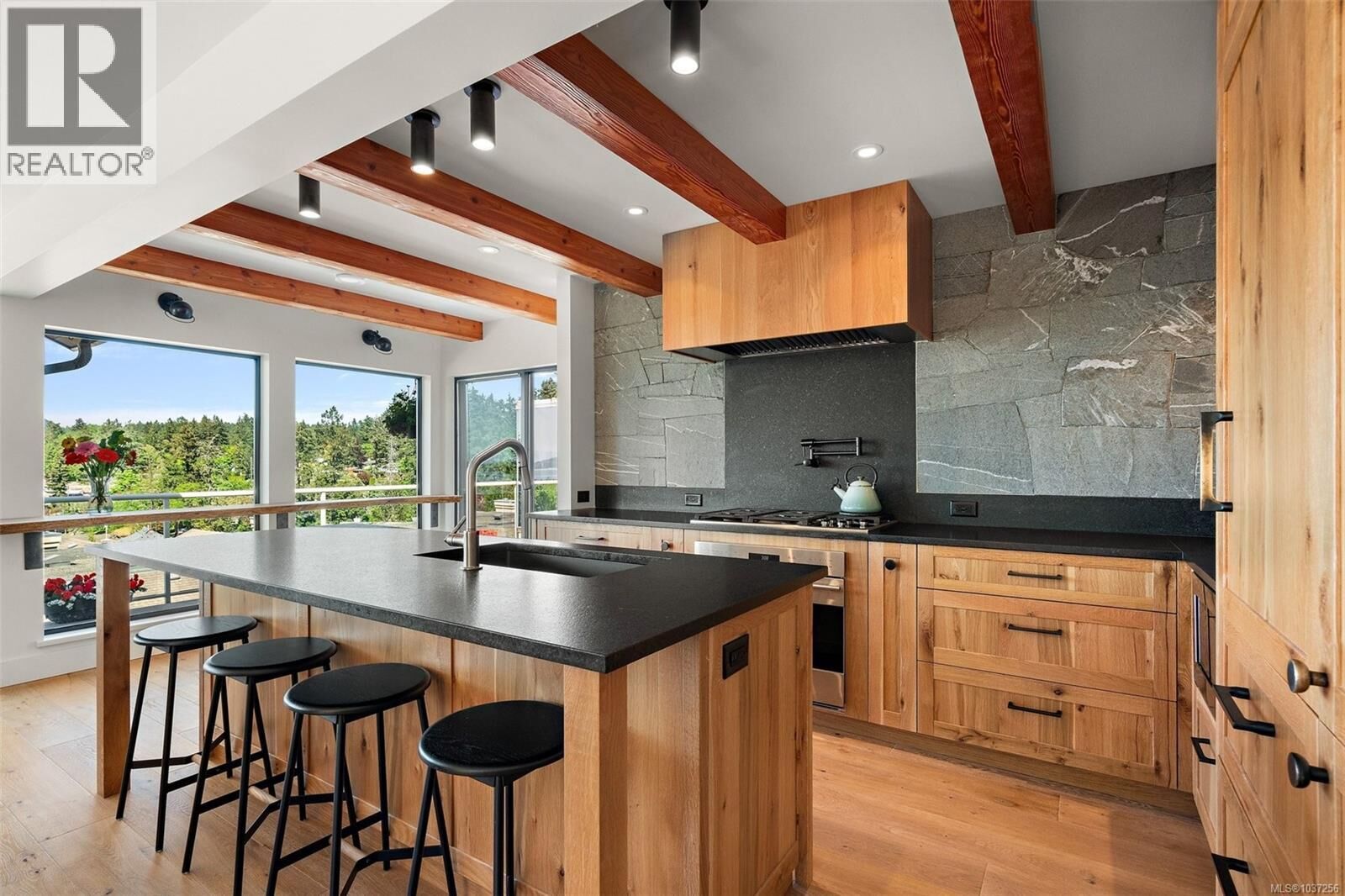 Property Photo:  6880 Wallace Drive 702  BC V8M 1N8 