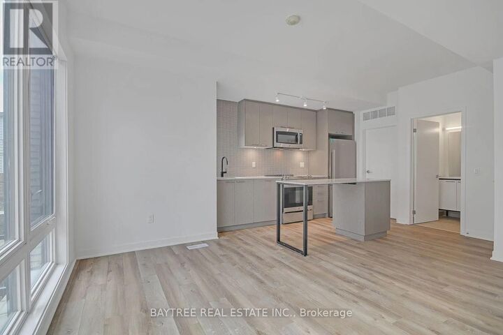 Property Photo:  30 Ed Clark Gardens Th4  ON M6N 0B5 