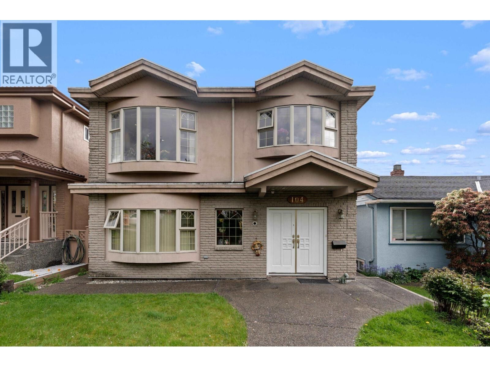 Property Photo: 104 East 63rd Avenue BC V5X 2J6