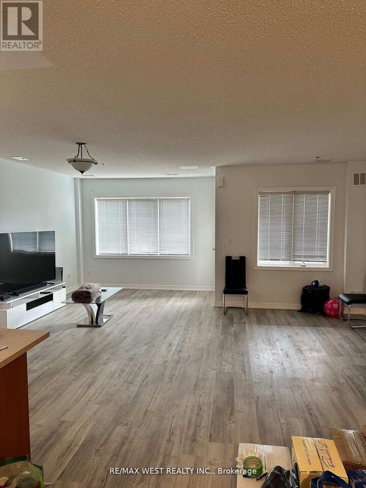 Property Photo:  9441 Jane Street 211  ON L6A 4H8 