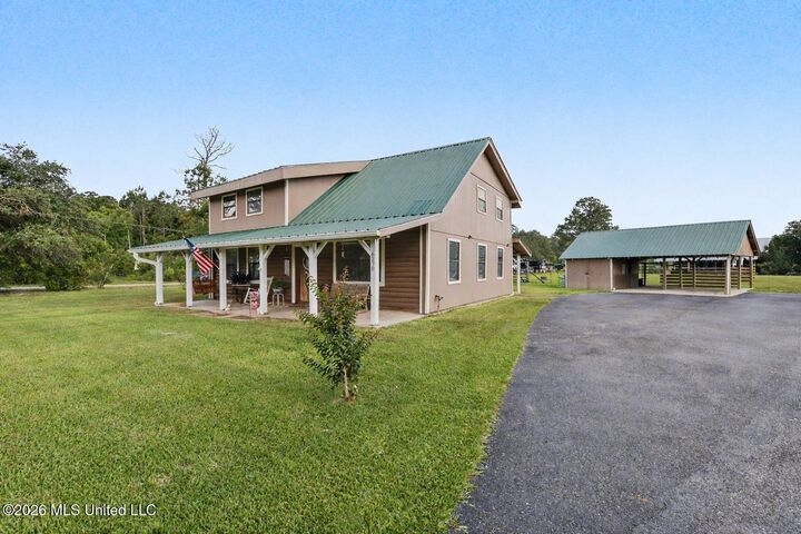 Property Photo:  6270 Lower Bay Road  MS 39520 
