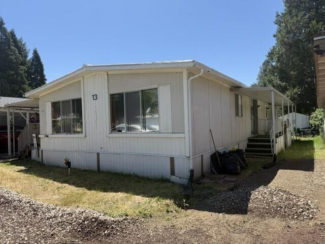 Property Photo:  315 W Evans Creek Road Unit 13  OR 97537 