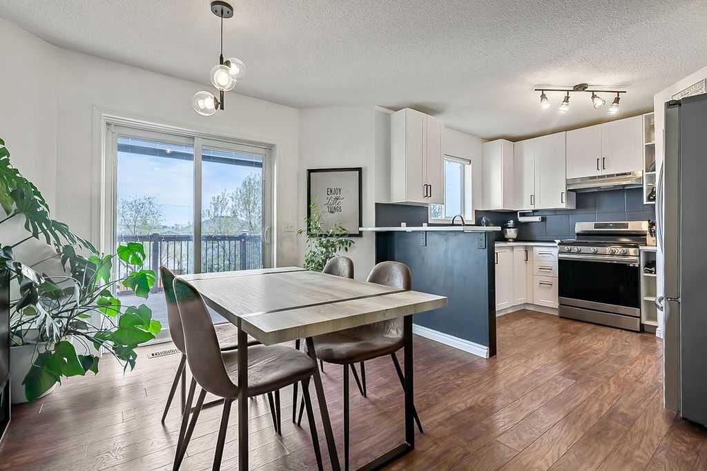 Property Photo:  145 Harvest Glen Way NE  AB T3K 4J4 