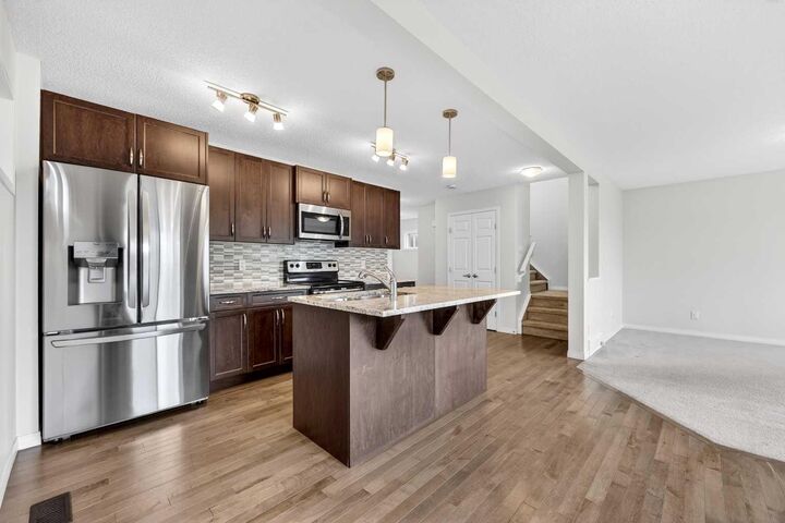 Property Photo: 99 Buckskin Way AB T4C 2P2