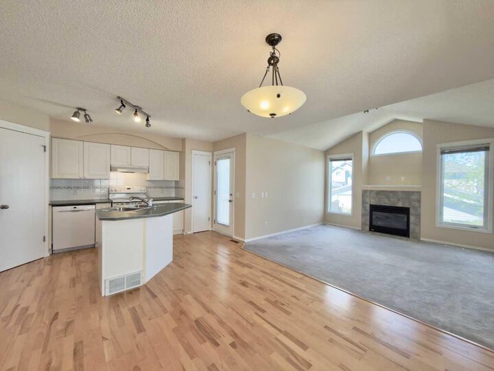 Property Photo: 206 Tuscany Drive NW AB T3L 2C4