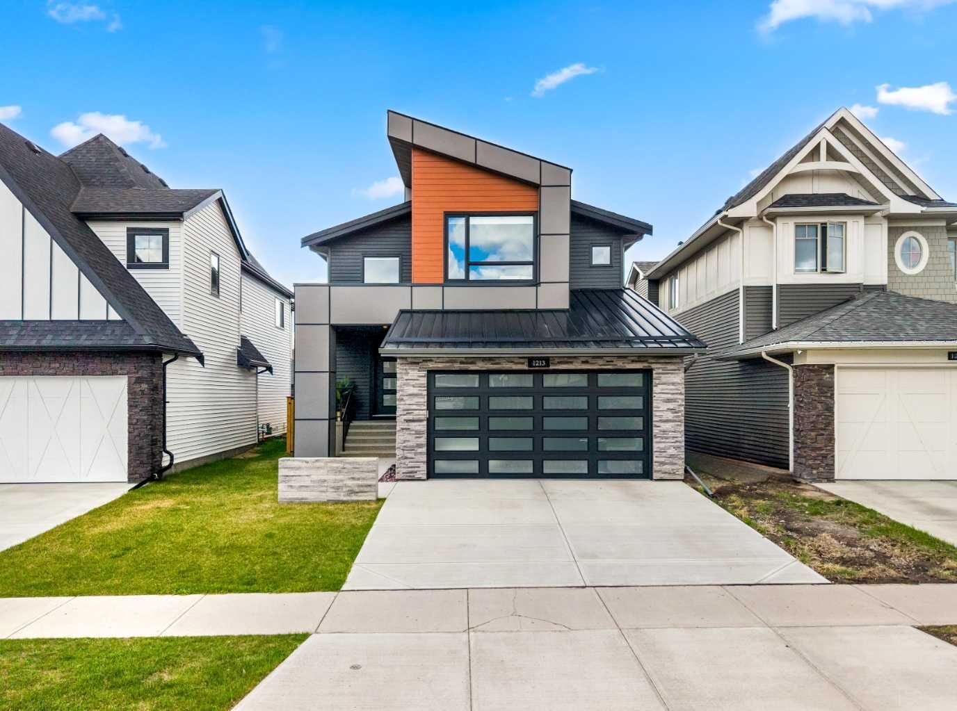 Property Photo:  1213 Coopers Drive SW  AB T4B 3T6 