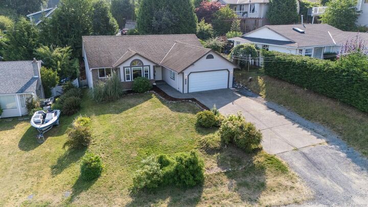 Property Photo:  5668 Rutherford Rd  BC V9T 6R2 