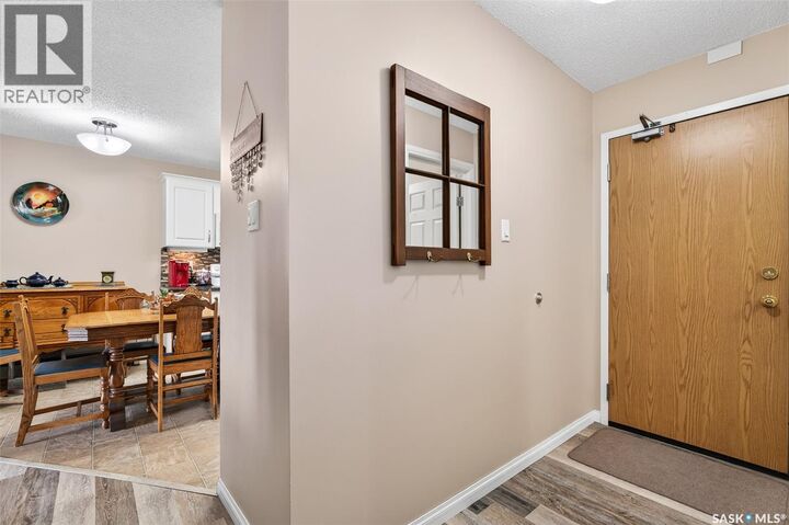 Property Photo:  308 55 Wood Lily Drive  SK S6J 1H1 
