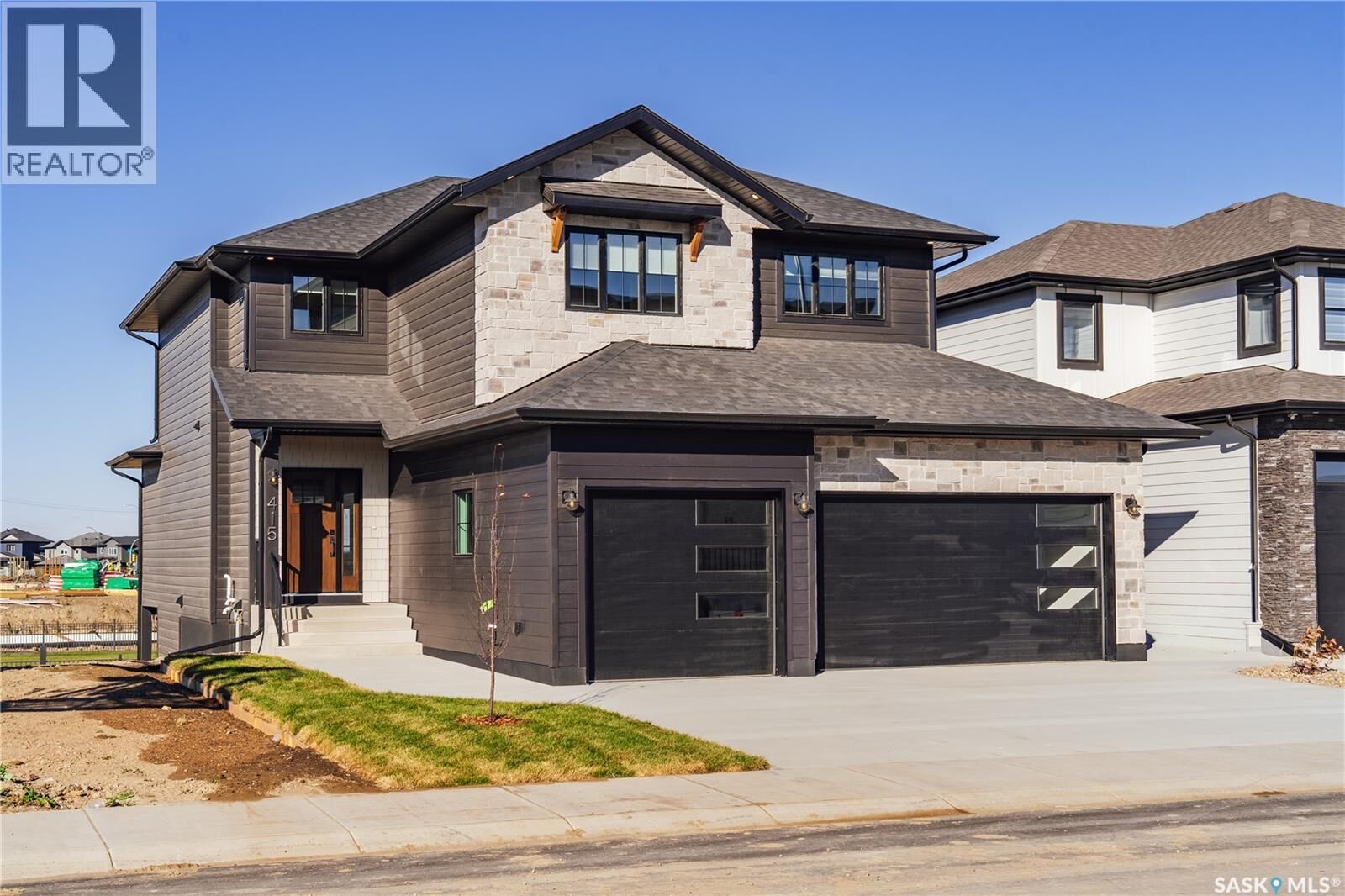 Property Photo:  415 Sharma Crescent  SK S7W 1K8 