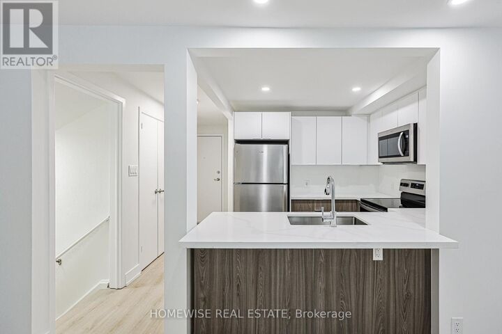 Property Photo:  100 Liberty Street North 18A  ON L1C 2M1 