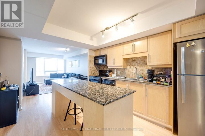 Property Photo: 20 Blue Jays Way 1705 ON M5V 3W6