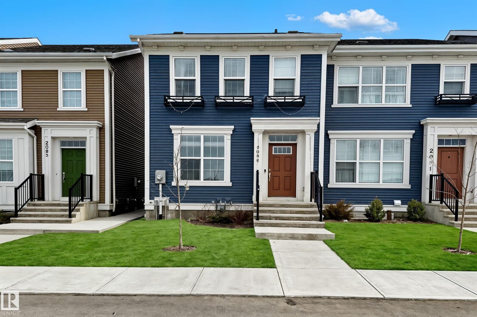 Property Photo: 2093 Maple Road NW AB T6T 2S8