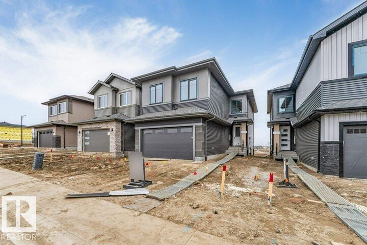 Property Photo: 1847 Crossbill Loop NW AB T5S 0S6