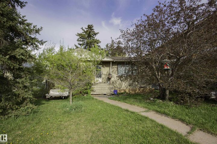 Property Photo:  11327 131 Street NW  AB T5M 1C5 
