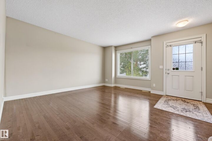 Property Photo:  14621 121 Street NW 6  AB T5X 0H2 