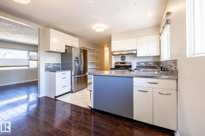 Property Photo:  5703 106 Avenue NW  AB T6A 1G1 