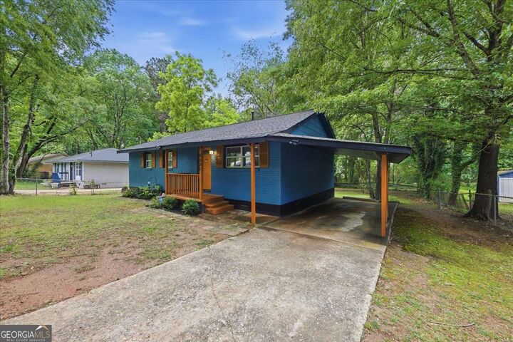 Property Photo:  8331 Attleboro Drive  GA 30238 