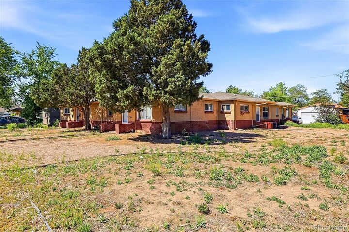 Property Photo: 1685 Chester Street CO 80010