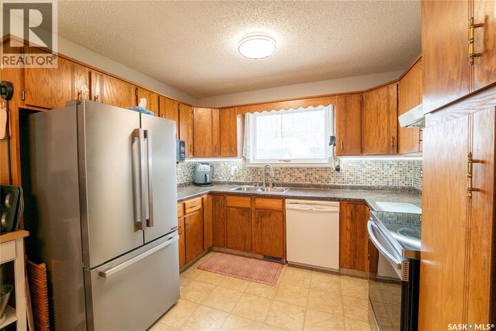 Property Photo:  406 Walter Scott Avenue  SK S0G 2E0 