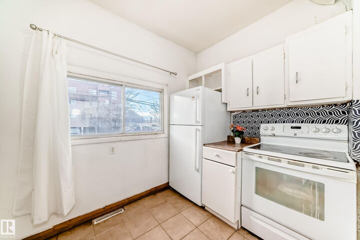 Property Photo: 10564 92 Street NW AB T5H 1T9