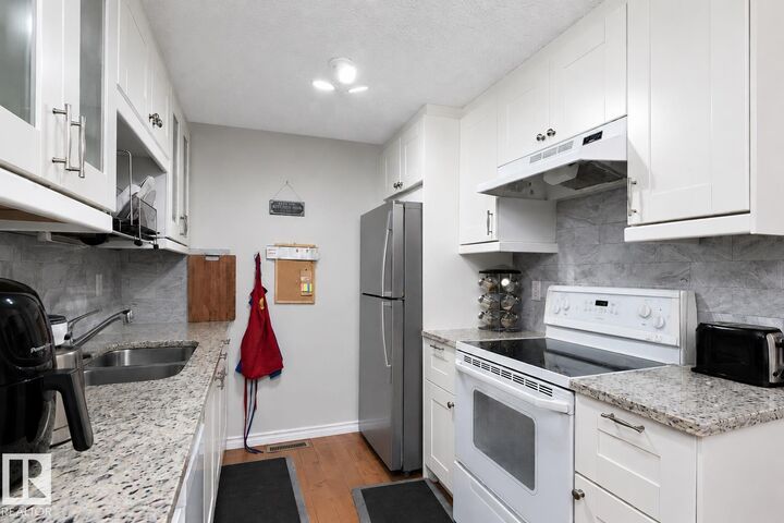 Property Photo:  6617 180 Street NW  AB T5T 2A3 