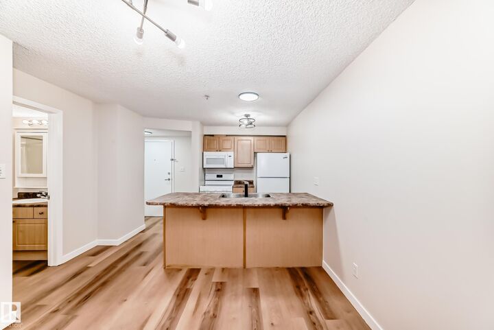 Property Photo: 12838 65 Street NW 108 AB T5A 5H3