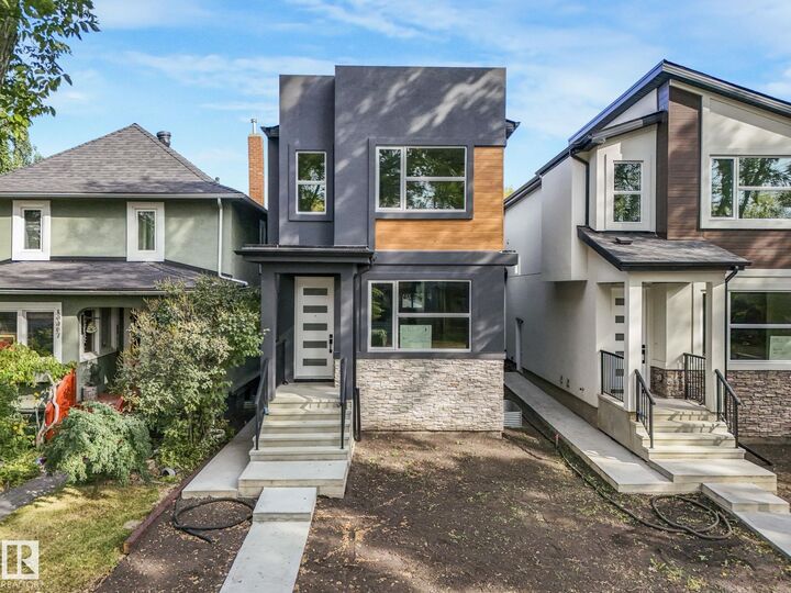 Property Photo:  10965 129 Street NW  AB T5M 0Y2 