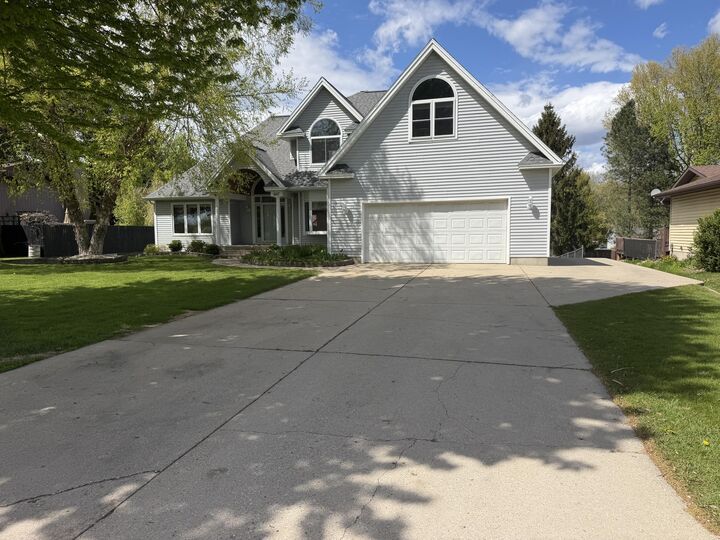 Property Photo:  607 Apache Drive  MI 49412 