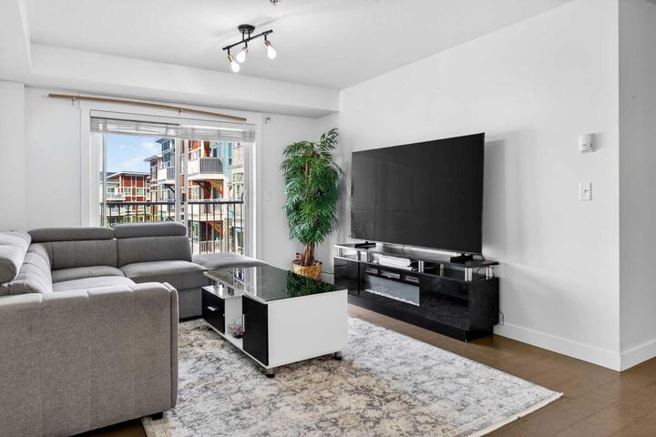 Property Photo: 302 Skyview Ranch Drive NE 2303 AB T3N 0P5