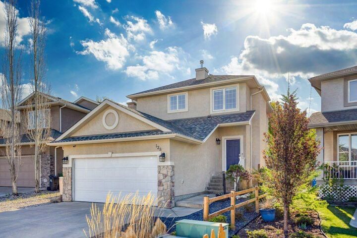 Property Photo:  128 Sunterra Heights  AB T4C 1W7 