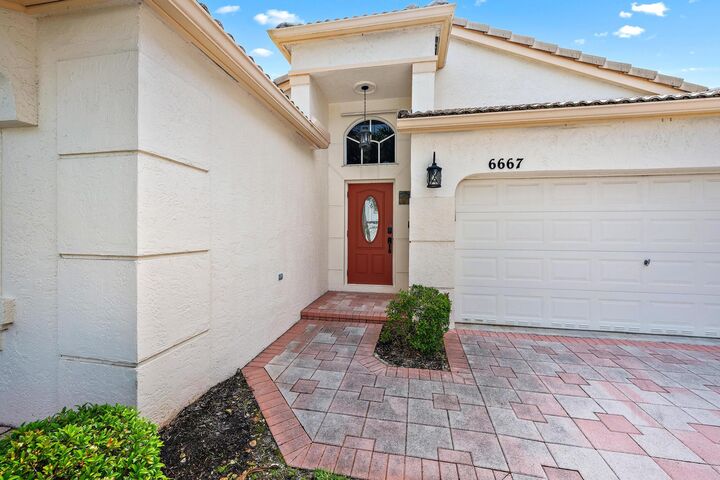 Property Photo: 6667 Waverly Lane FL 33467