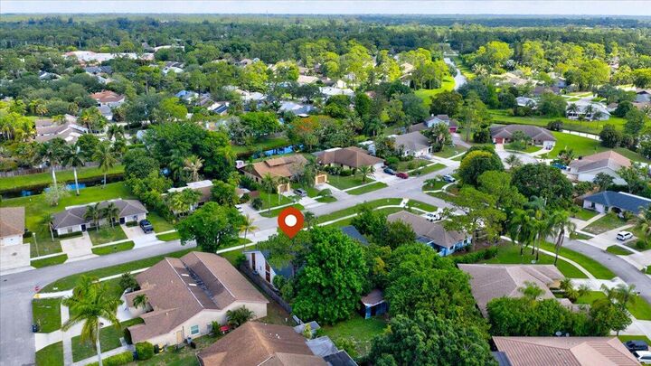 Property Photo: 12452 Guilford Way FL 33414