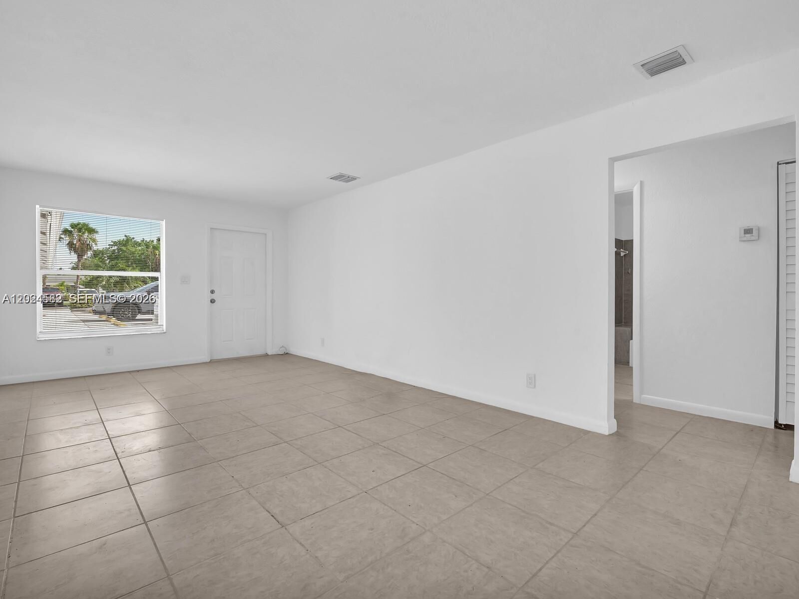 Property Photo:  241 NW 40th St 1-6  FL 33309 