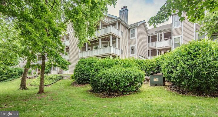 Property Photo:  14321 Climbing Rose Way 204  VA 20121 