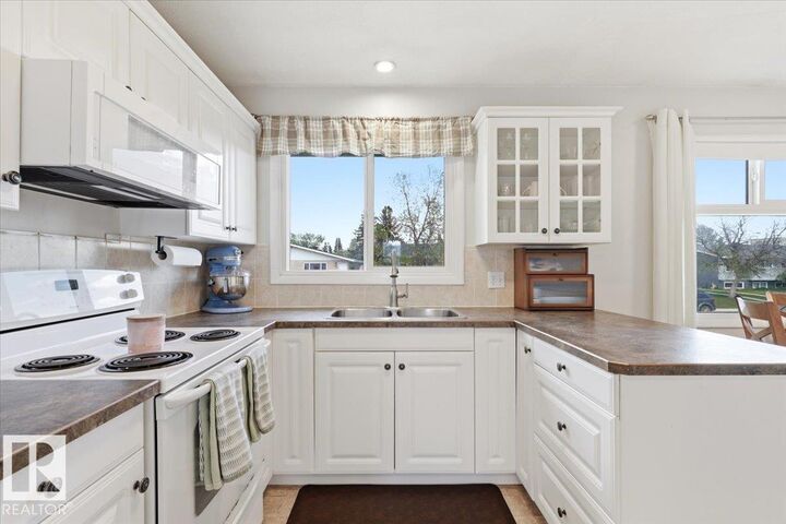 Property Photo:  5409 55 Avenue  AB T9A 1A4 