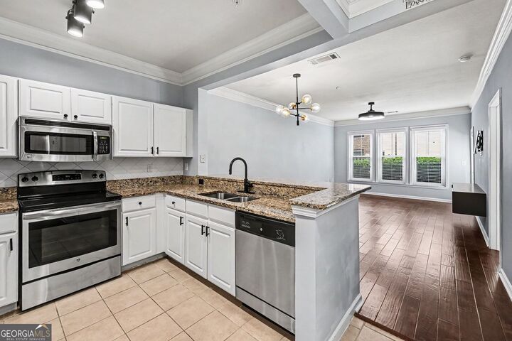 Property Photo:  1850 Cotillion Drive 2102  GA 30338 