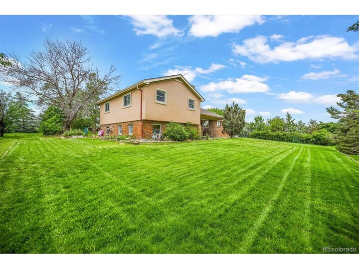 Property Photo:  1335 S Kio St  CO 80137 