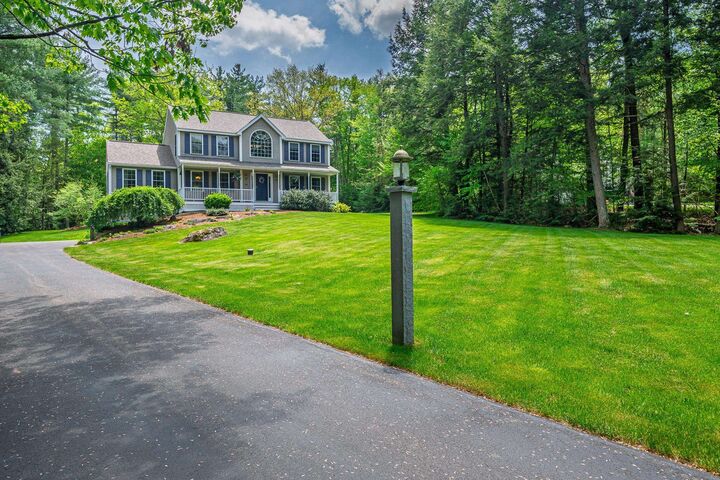 Property Photo:  136 Annand Drive  NH 03055 