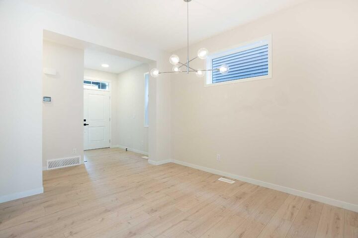Property Photo: 53 Creekside Passage SW AB T2X 5V6