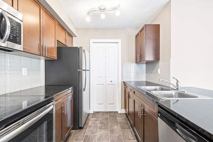 Property Photo:  625 Glenbow Drive 3108  AB T4C 0S9 