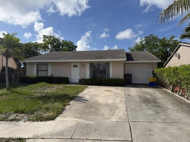 Property Photo: 7355 Pinedale Drive FL 33436