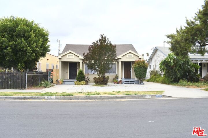 Property Photo:  3973 S Van Ness Ave  CA 90062 
