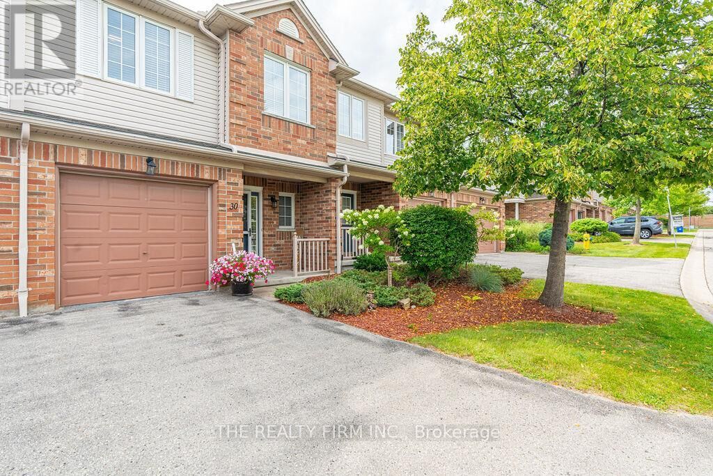 Property Photo: 320 Ambleside Drive 30 ON N6G 5H9