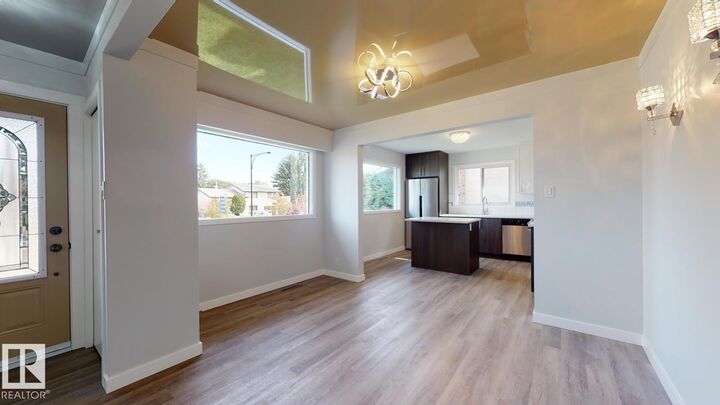 Property Photo:  11744 135 Street NW  AB T5M 1L3 