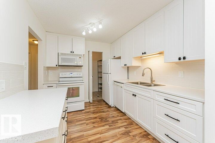 Property Photo: 1503 Mill Woods Road NW 11 AB T6L 4C2