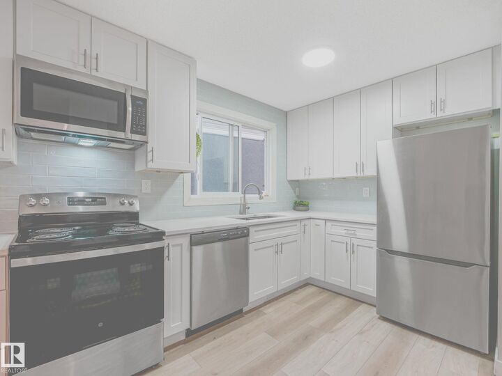 Property Photo: 550 Lakewood Road NW AB T6K 3Y1