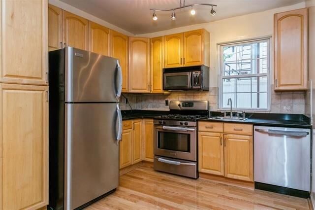 Property Photo:  320 6th St 1  NJ 07087 