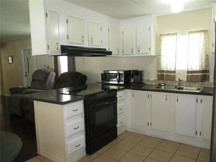 Property Photo:  92 Rosalie Oaks Boulevard  FL 33898 