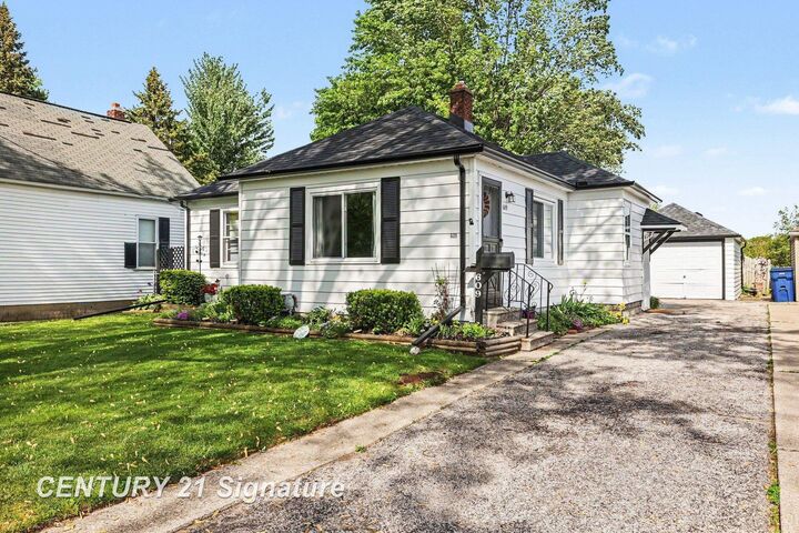 Property Photo:  609 S Alp Street  MI 48706 
