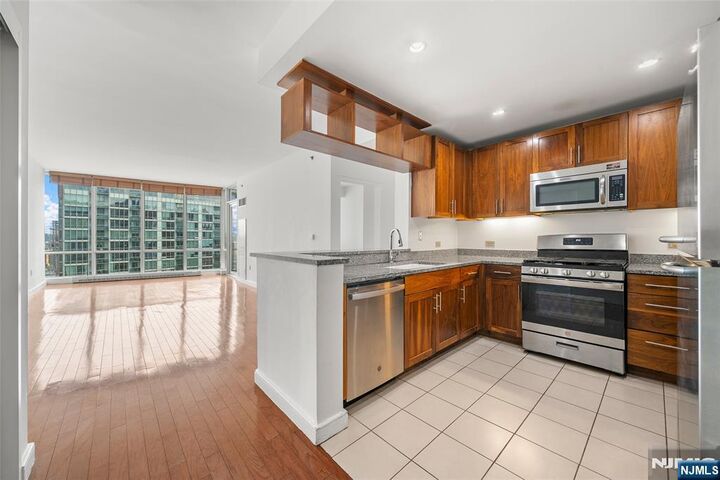 Property Photo: 20 Newport Parkway 2311 NJ 07310